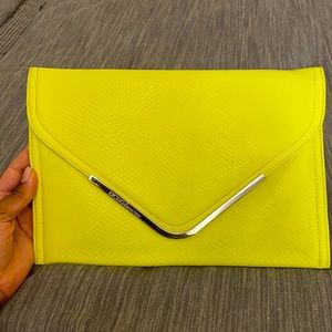 Neon yellow envelope clutch